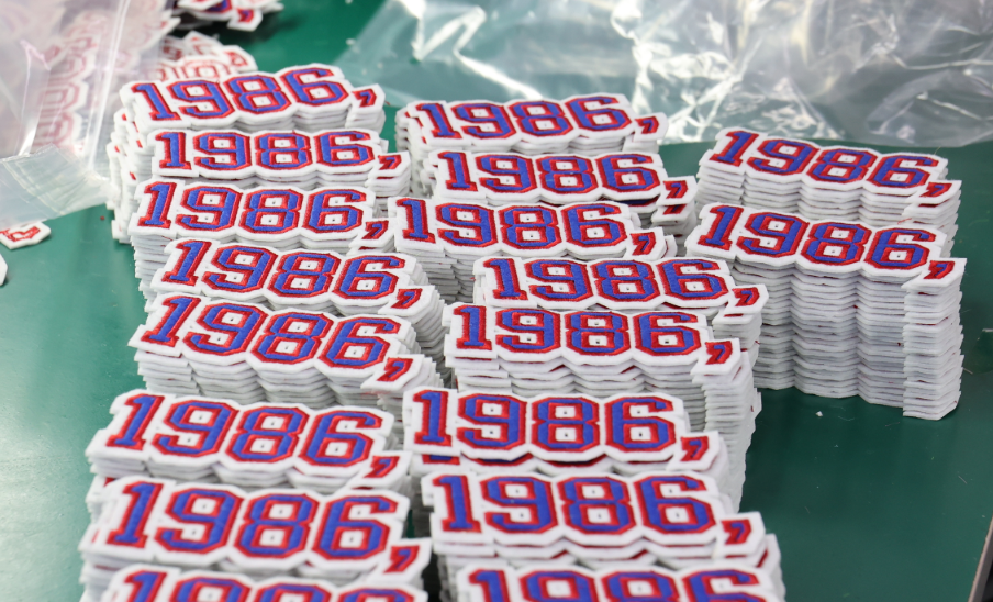 Bulk custom patch production in the LOVECOLOUR factory in Guangzhou.