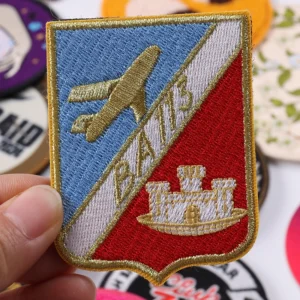 Rectangular blue red and gold aviation crest embroidered patch