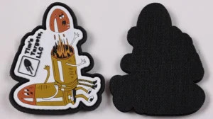 Front and black hook-and-loop back of a custom cartoon PVC patch