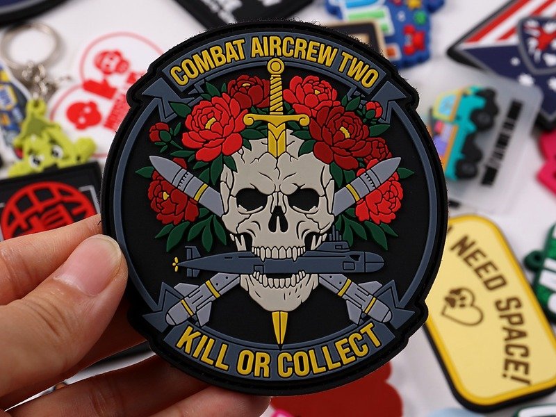Round black custom PVC rubber patch with skull, roses, swords and Combat Aircrew Two artwork
