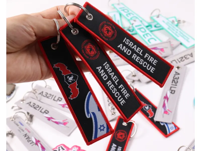 Black and red Israel Fire and Rescue embroidered fabric keychains with metal rings