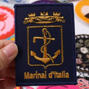 Navy blue rectangular embroidered patch with gold ship crown anchor and Marina d Italia text