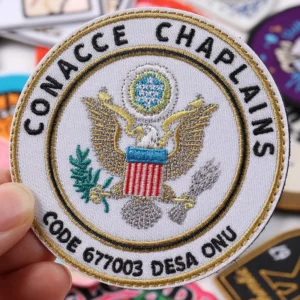 Round white embroidered military chaplains patch with eagle crest and gold border