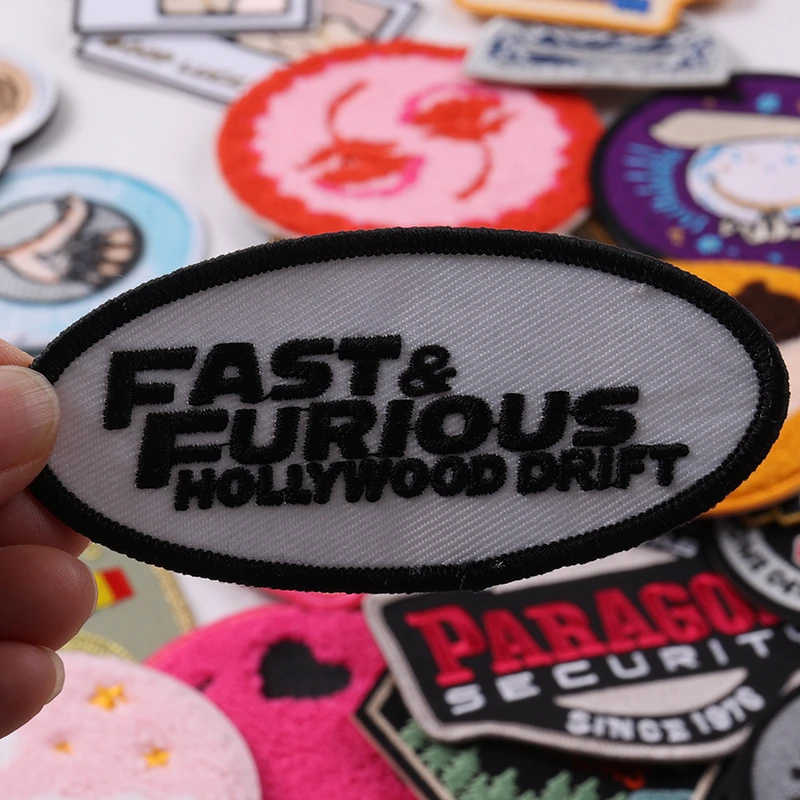Oval Fast and Furious Hollywood Drift embroidered patch in black white and red