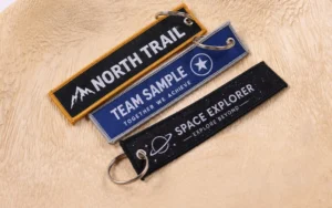 Navy North Trail Team Sample and Space Explorer fabric keychains