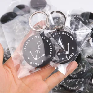 Black Ocean Future Zone PVC keychains individually packaged in clear bags