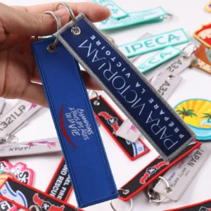 Long blue Regional Youth Leadership fabric keychain with metal hardware