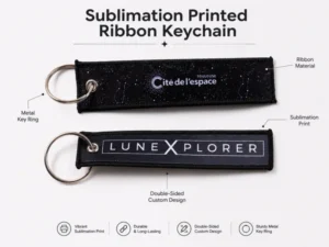 Two black ribbon keychains with printed white logos and metal split rings