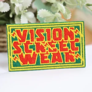 Vision Street Wear rectangular embroidered patch in red yellow and green