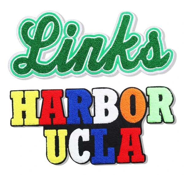 Green Links script patch above multicolored HARBOR and UCLA block-letter patches on white.