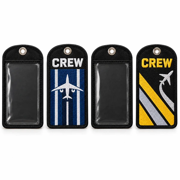 Four black aviation ID holders showing two clear card pockets and embroidered CREW designs in blue and white or yellow, grey and black.